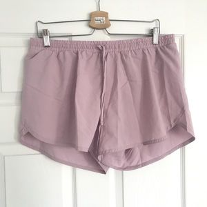 Dolphin Hem Run Short in Lilac